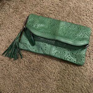 Green leather clutch